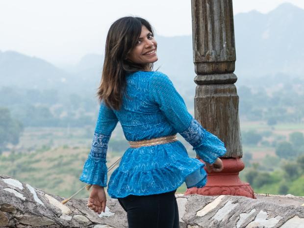 PADI AmbassaDiver Radhika Sharma posing for an outdoor photo.